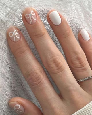 @pink_oblivion bow nail design