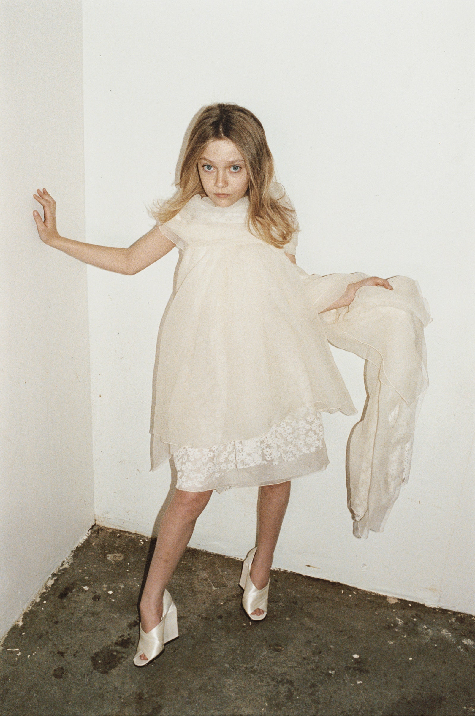 Image may contain Dakota Fanning Clothing Dress Footwear Shoe High Heel Child Person Formal Wear Face and Head