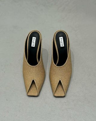 Alaia peep-toe pumps in raffia