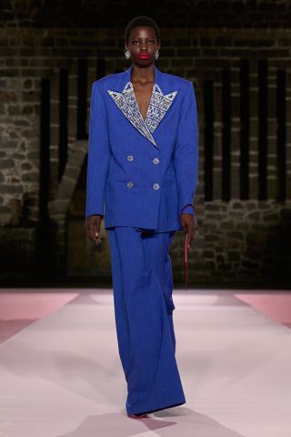 Carolina Herrera blue pantsuit on the runway