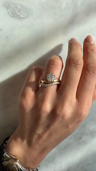 Woman wearing Roen NYC engagement ring.