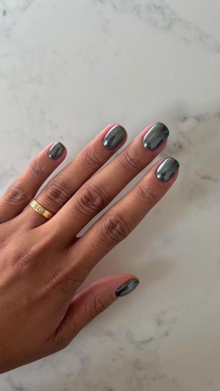 Dark green chrome nails