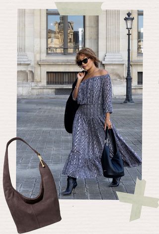 One of the best Michael Kors bags is shown in a photo of a woman walking in Paris carrying a black blazer over her shoulders while wearing an off-the-shoulder gray snakeskin print maxi dress with black knee-high boots and Michael Kors' Sonny hobo shoulder bag