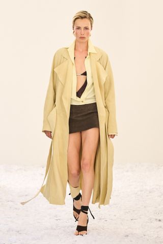 Model wears butter yellow and brown on the 16Arlington Spring/Summer 2025 runway.