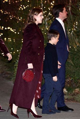 Princess Beatrice wears a burgundy coat