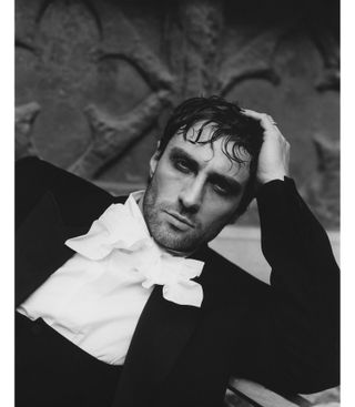 Aaron Taylor-Johnson wears a tuxedo with statement collar.