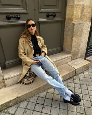 Fashion influencer @annelauremais in Europe wearing an anti-trend outfit styled with winter wardrobe staples.