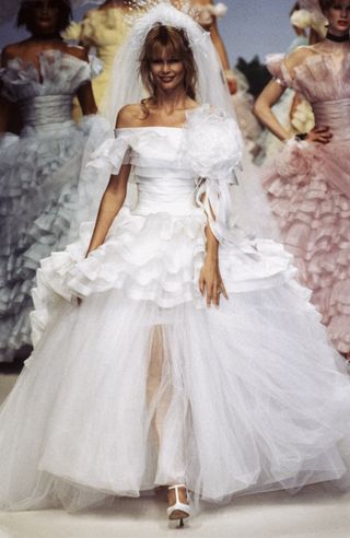 Claudia Schiffer walks the runway as a Chanel bride