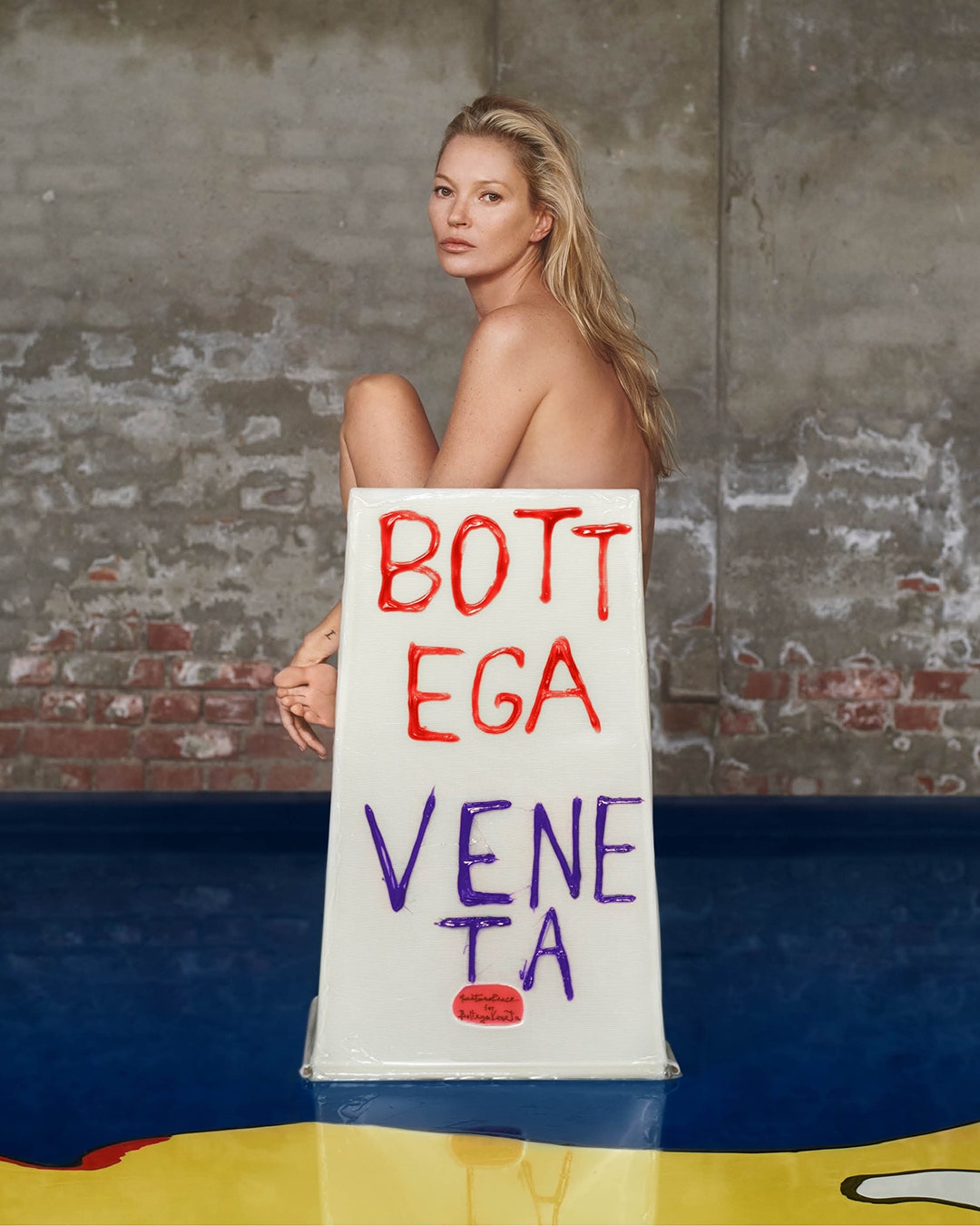 Image may contain Kate Moss Banner Text Adult Person Face Head Photography and Portrait