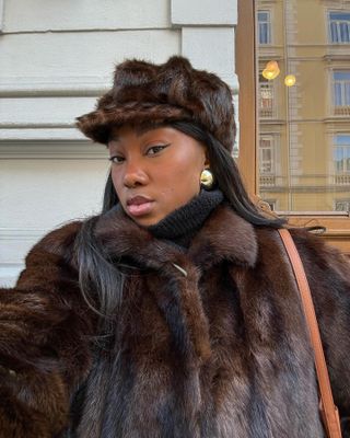 Nnenna Echem in a faux fur Vaillant Studio hat