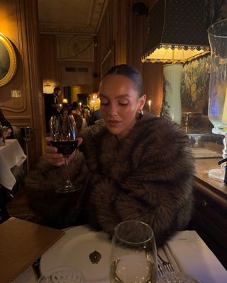 Emma Leger in an SLA the Label faux fur coat