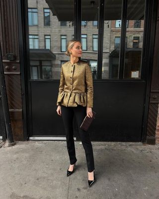 fashion influencer Claire Rose wearing a gold peplum Liberowe evening jacket with jeans