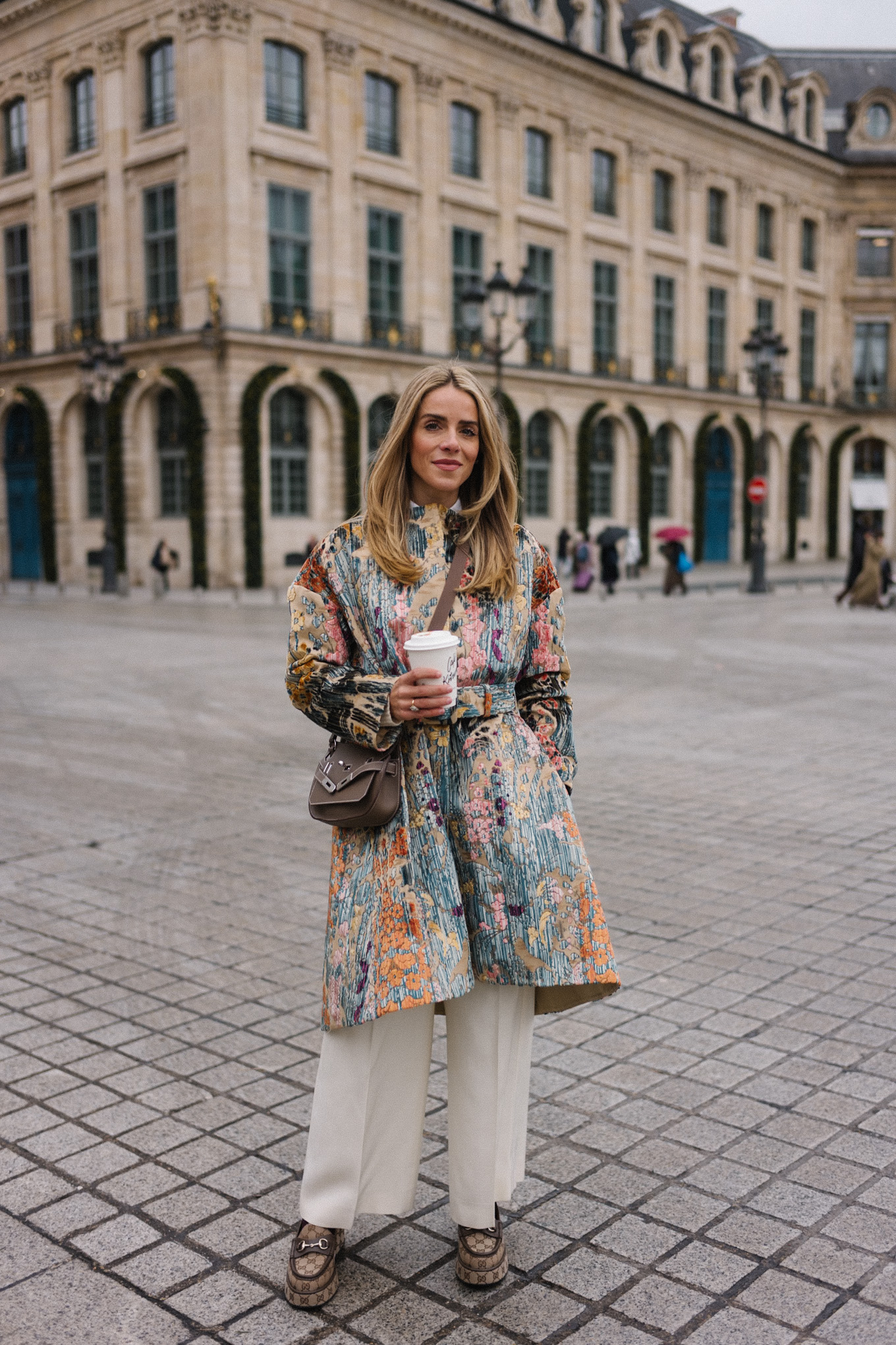 pastel brocade jacquard coat white pants tan loafers taupe crossbody bag