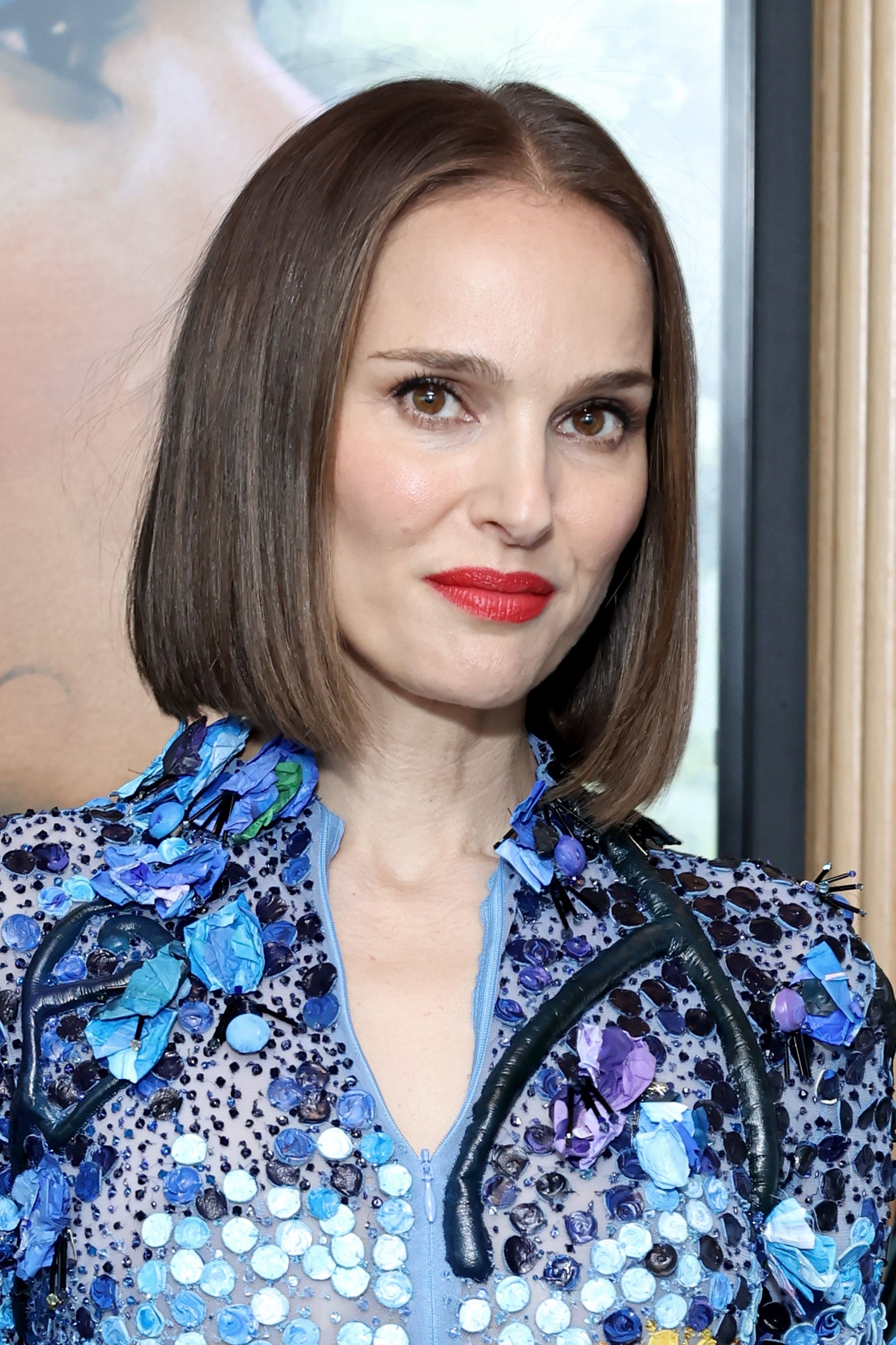 Image may contain Natalie Portman Face Head Person Photography Portrait Adult Blonde Hair Blouse and Clothing