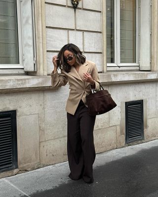 Outfit ideas 2025: @slipintostyle wears a blazer and wide-leg trousers