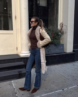 Sara Walker in a Sandro faux fur coat