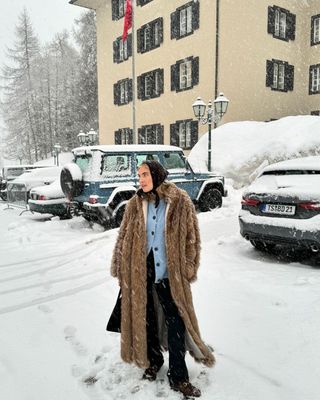 winter snow day outfits: balaclava, faux fur coat, cardigan