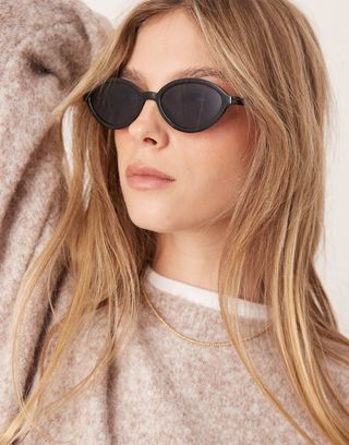 Asos Design Slim Oval Sunglasses in Black