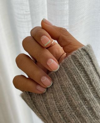 @rochellehumes pastel green French tip nails