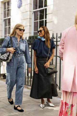 Woman attending London Fashion Week wearing silver shoes.