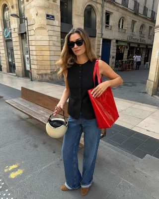 Anne Laure Mais with red Sezane shopper bag