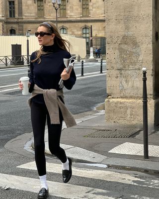 Adenorah in leggings and loafers