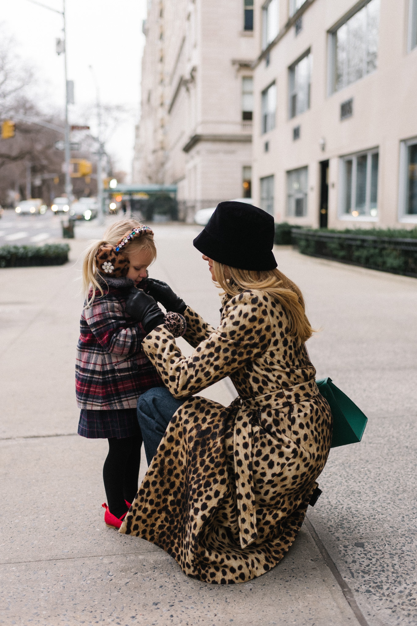 cheetah print wool coat black velvet bucket hat nyc at christmas