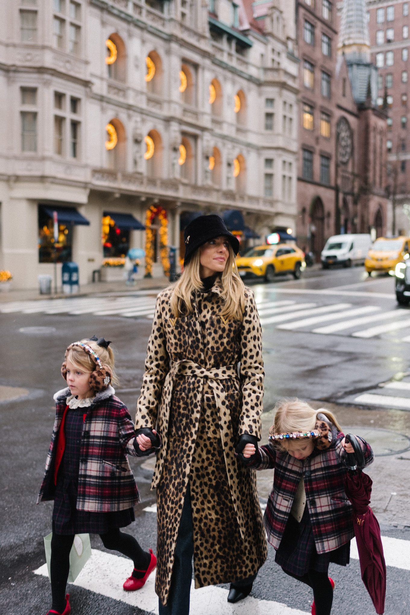 cheetah print wool coat black velvet bucket hat nyc at christmas