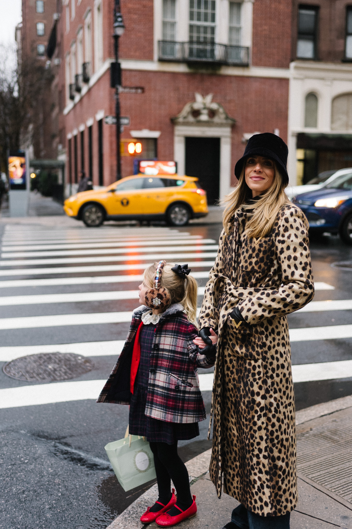 cheetah print wool coat black velvet bucket hat nyc at christmas