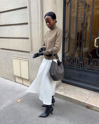 A fashion person in a turtleneck.