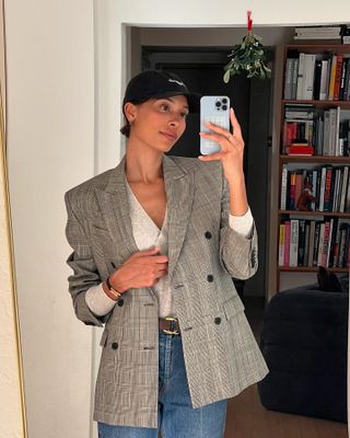 A fashion person in a double-breasted blazer.