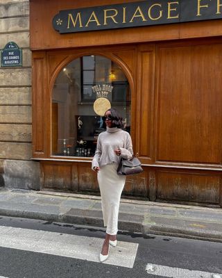 Aïda BADJI in white satin skirt