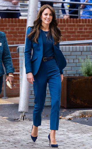 Kate Middleton wears a blue suit