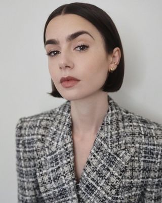 Lily Collins wearing the square bob, a key bob hair trend 2025