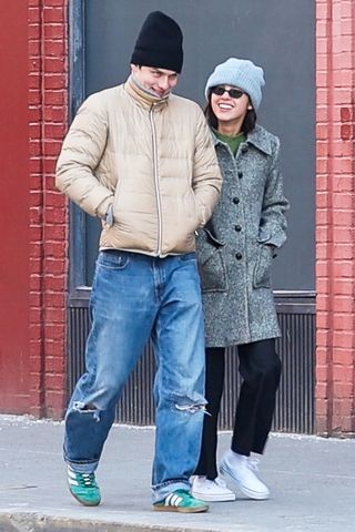 Olivia Rodrigo and Louis Partridge walking in NYC