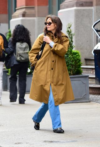 Katie Holmes wears jeans and loafers.