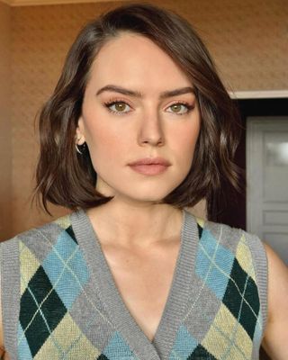 Daisy Ridley with side-parted tousled bob haircut