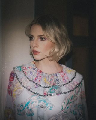 Lucy Boynton with tousled bob haircut