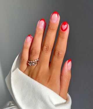 @iramshelton red heart French tip nails