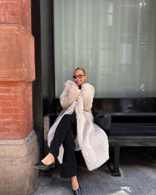 Fashion influencer @fredrika_ekerot wearing a rich-looking outfit styled with elegant winter staples for 2025.