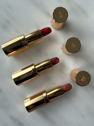 Celine lipsticks on a marble table