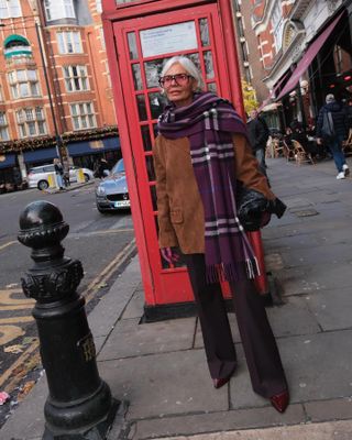 Grece Ghanem in scarf and jacket.