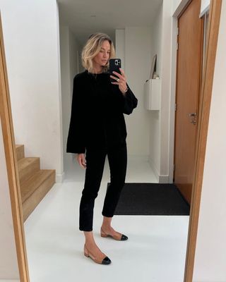 outfit image of an influencer wearing the cigarette trousers trend