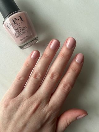 Junior beauty editor Grace Lindsay wearing OPI put it in neutral nail polish