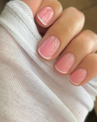 Bright sheer pink glow French manicure