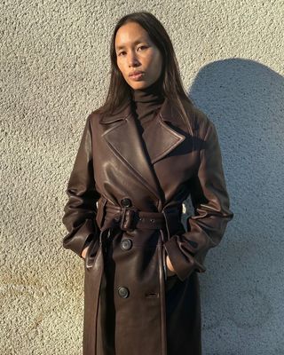 Anne-Victoire in a leather trench coat