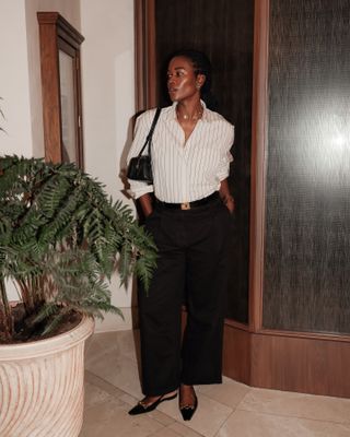 Fashion influencer @nlmarilyn wearing an elegant, on-trend outfit that taps into the 