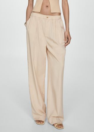 Lyocell Pleated Trousers - Women | Mango Niger