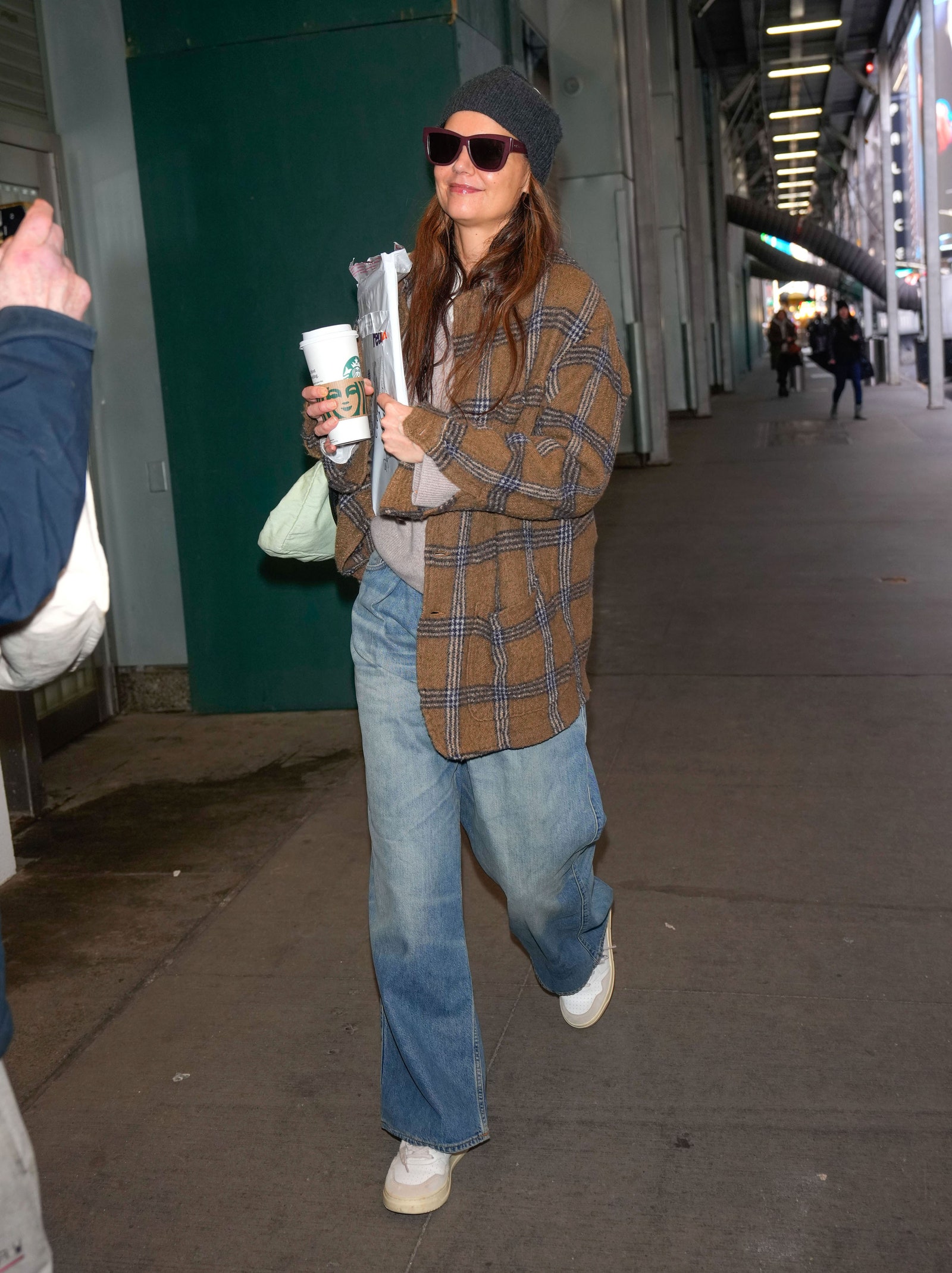 Image may contain Katie Holmes Clothing Pants Jeans Footwear Shoe Person Teen Hat Accessories Glasses and Bag