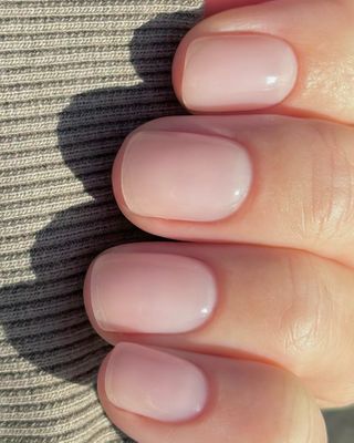 A strawberry milk manicure